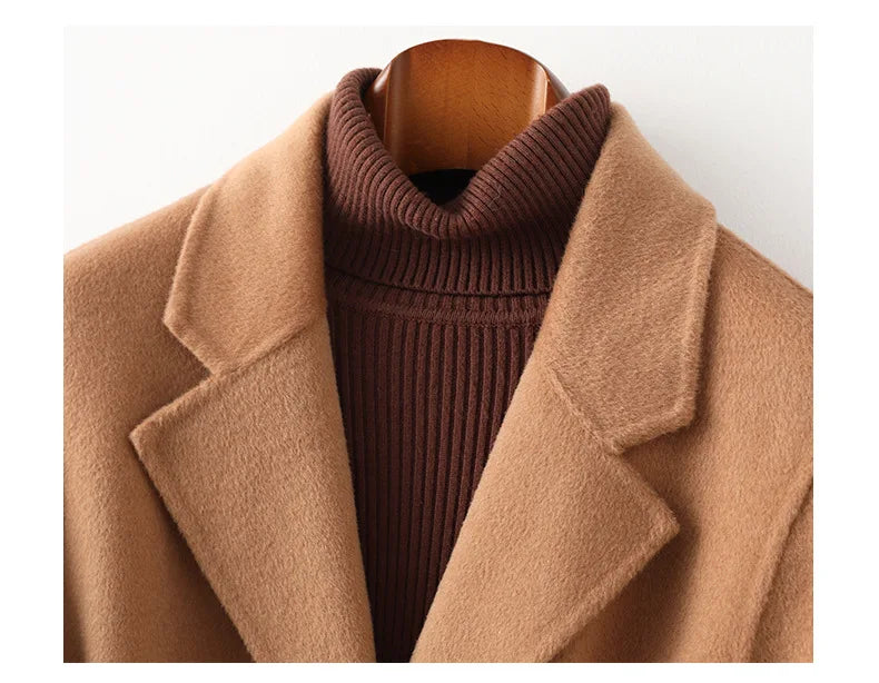 Olivia long belted wool coat for women by Christine Brewer, featuring a tailored fit and classic design in neutral wool fabric.