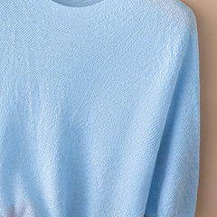 Christine Brewer Frankie wool sweater for women, cozy knit with ribbed cuffs and neckline, in neutral tones.