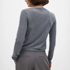 Women’s knit cardigan by Christine Brewer, Finley. Soft, cozy knit fabric with a classic button-up design and long sleeves.