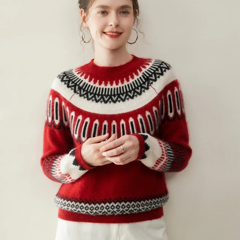 Woman wearing Christine Brewer Emory cashmere crew neck sweater, showcasing soft, luxurious knit fabric and classic fit.