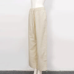 Women’s cotton linen wide-leg drawstring trousers by Christine Brewer, loose pull-on pants in a relaxed fit and casual style.