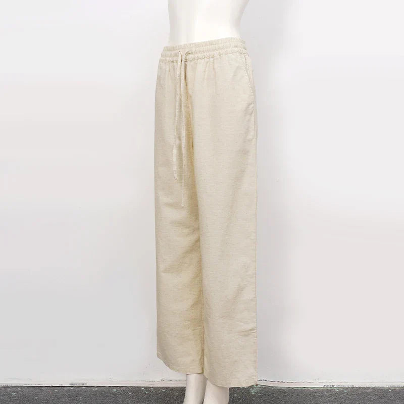 Women’s cotton linen wide-leg drawstring trousers by Christine Brewer, loose pull-on pants in a relaxed fit and casual style.