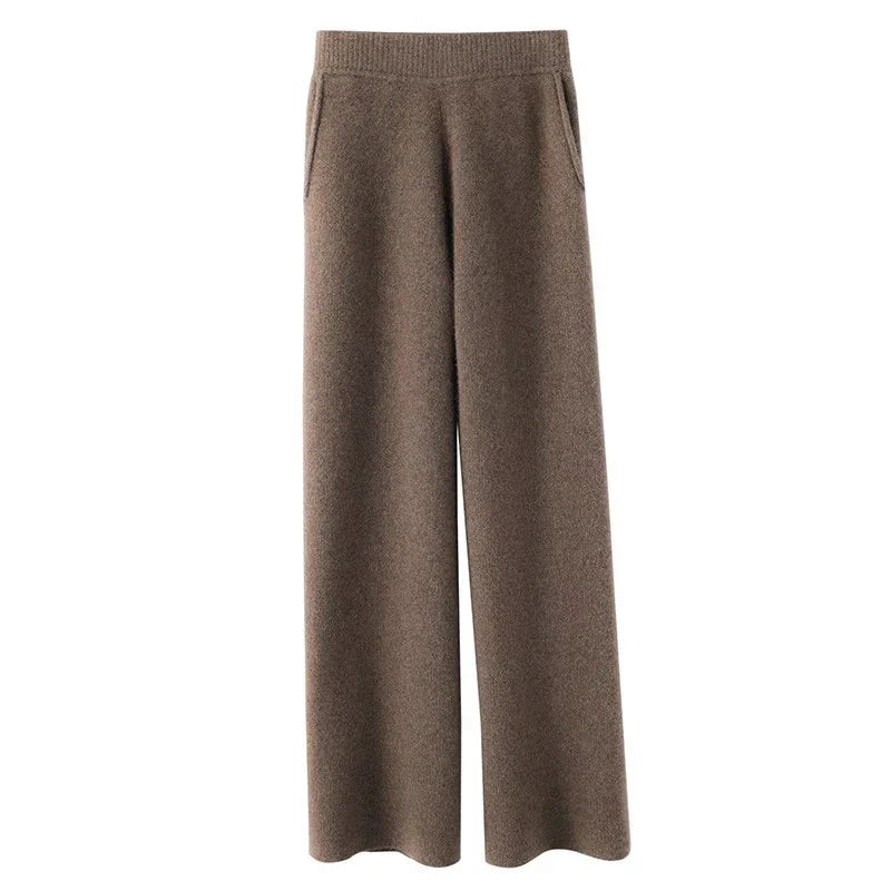 Women's loose pull-on joggers by Christine Brewer, comfortable casual pants with tapered fit and elastic waistband.
