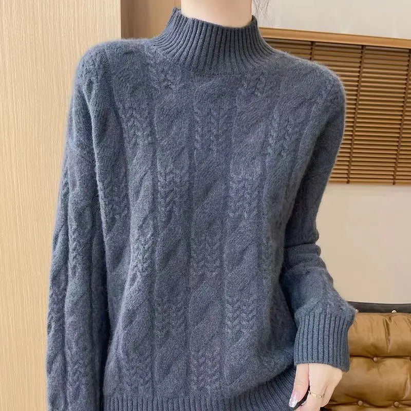 Cream-colored Janet cashmere cable knit sweater for women by Christine Brewer, featuring a cozy, textured knit design.