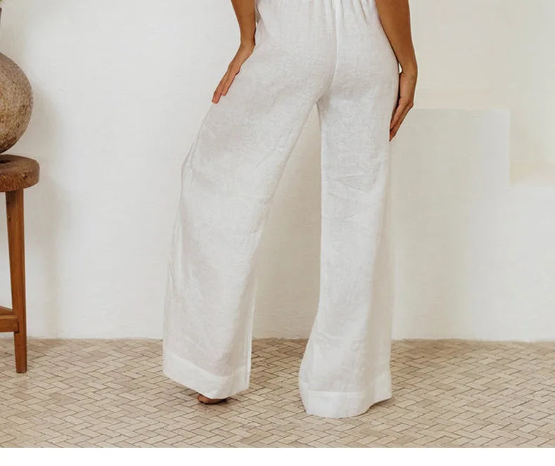 Light beige linen wide-leg trousers for women with a loose pull-on style, featuring a relaxed fit and comfortable waistband.