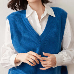 Cashmere ribbed knit sweater vest for women by Christine Brewer, featuring a stylish and cozy design in a neutral color.