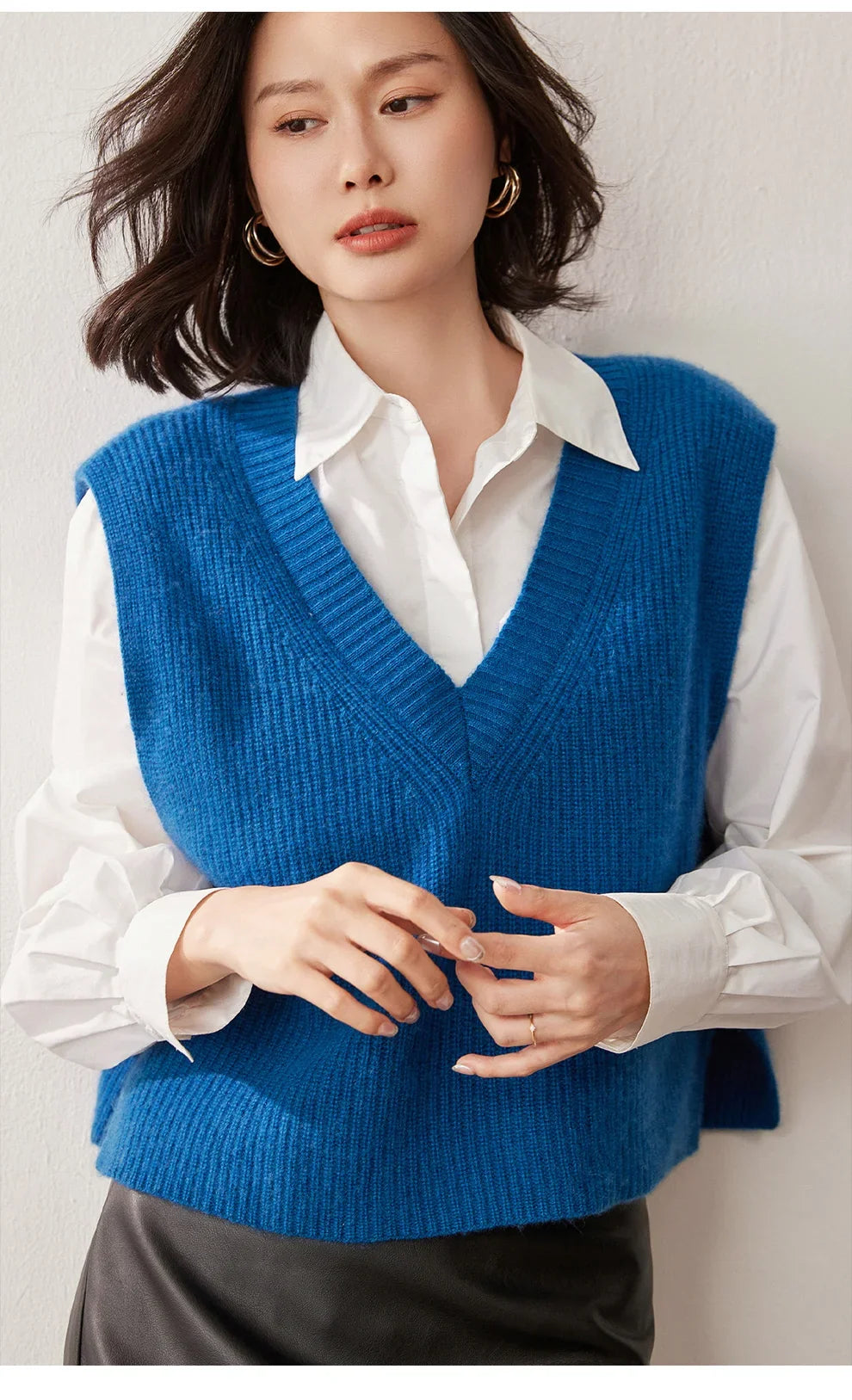 Cashmere ribbed knit sweater vest for women by Christine Brewer, featuring a stylish and cozy design in a neutral color.