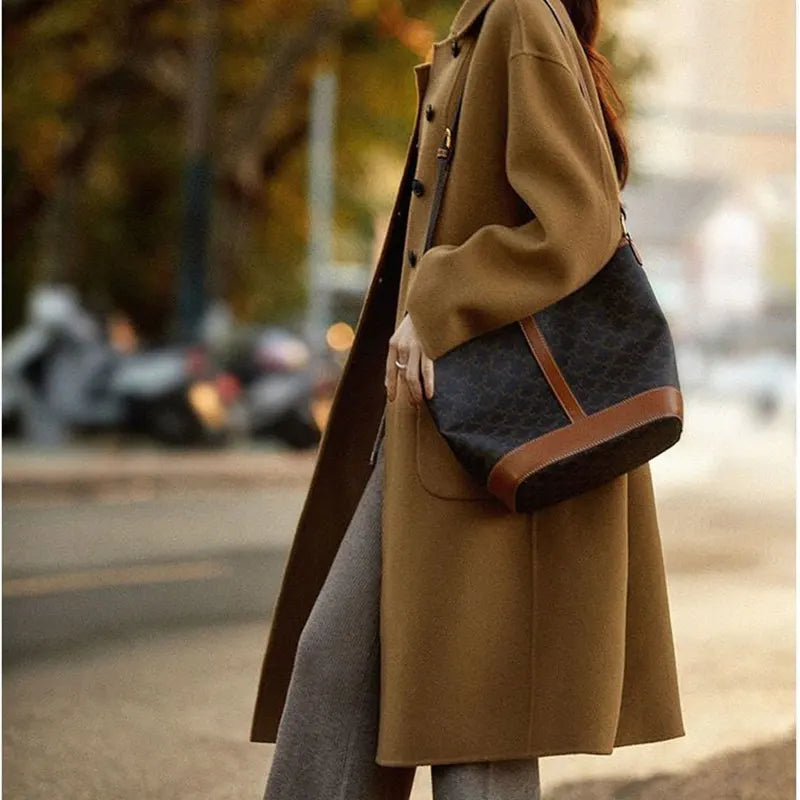 Green long wool coat for women, Lucy by Christine Brewer, featuring a tailored fit and classic style in a high-quality fabric.