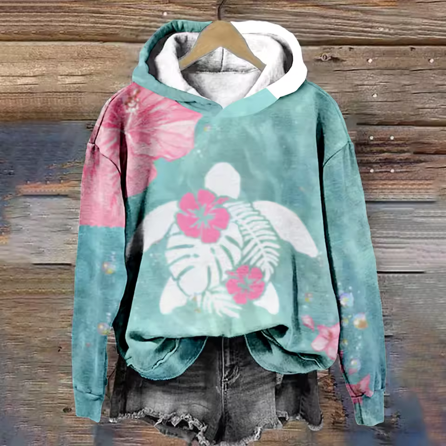 Christine Brewer Phoebe cozy lightweight oversized soft knit hoodie, soft fabric, relaxed fit, in a neutral color.