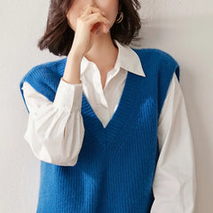 Cashmere ribbed knit sweater vest for women by Christine Brewer, featuring a stylish, textured design in neutral tones.