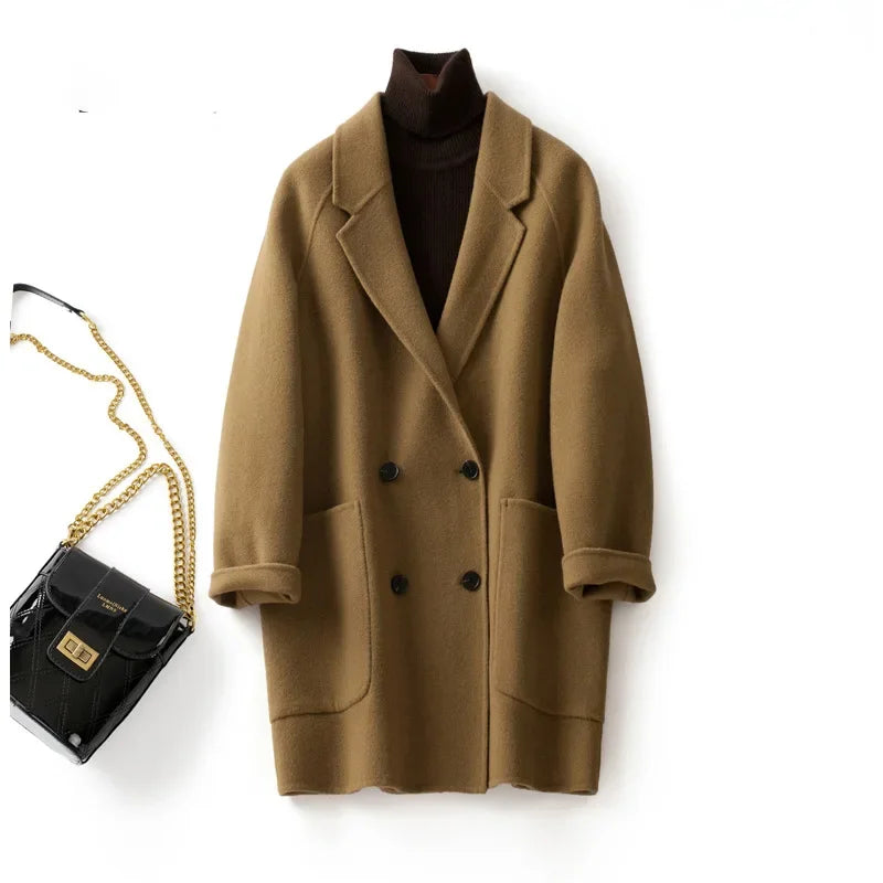 Brown double-breasted wool coat for women by Christine Brewer, featuring classic tailoring and stylish design.