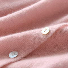 Pink Dorothy knit sweater for women by Christine Brewer, featuring a cozy, stylish design with ribbed cuffs and neckline.