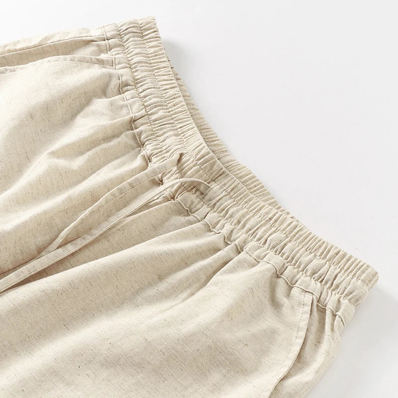 Women’s cotton linen wide-leg drawstring trousers by Christine Brewer, loose pull-on pants with relaxed fit and comfortable style.
