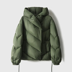 Pink cropped hooded puffer jacket for women by Christine Brewer, featuring a quilted design and cozy hood.