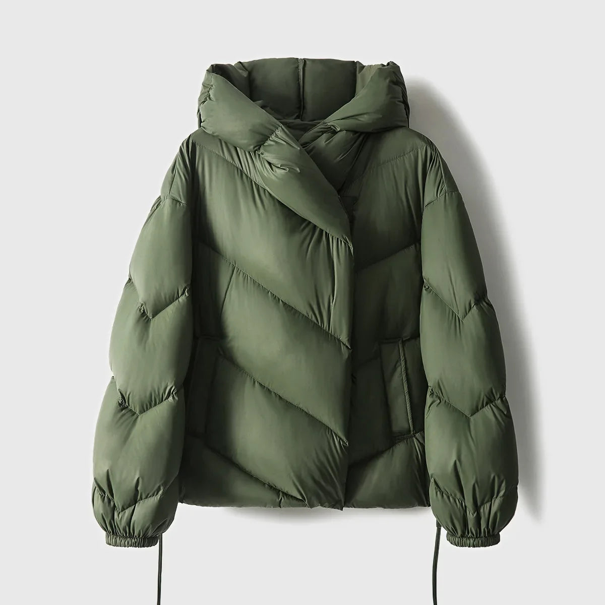 Pink cropped hooded puffer jacket for women by Christine Brewer, featuring a quilted design and cozy hood.