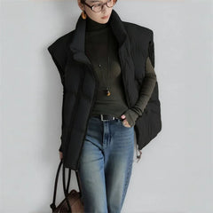 Christine Brewer Layla cropped puffer vest for women, lightweight quilted vest with stand collar and sleeveless design.