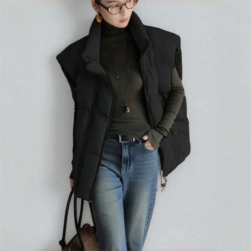 Christine Brewer Layla cropped puffer vest for women, lightweight quilted vest with stand collar and sleeveless design.