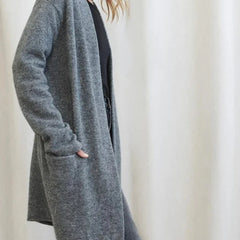Jacqueline Merino wool cardigan for women by Christine Brewer, featuring a cozy, fitted design in soft, natural wool fabric.