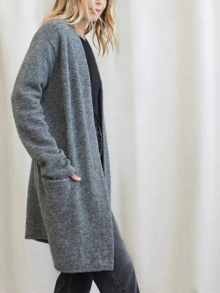 Jacqueline Merino wool cardigan for women by Christine Brewer, featuring a cozy, fitted design in soft, natural wool fabric.