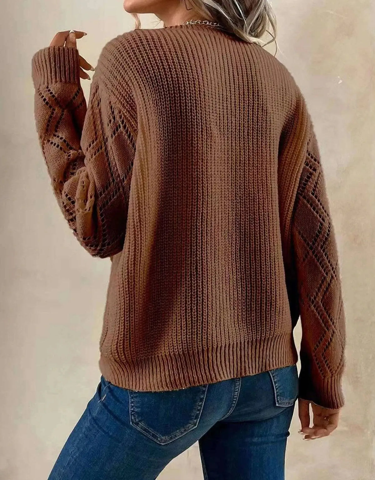 Beige V-neck sweater for women from Christine Brewer's Jenna collection, featuring a cozy knit fabric and classic fit.