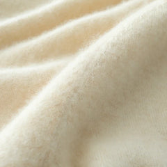 Helen cashmere sweater for women by Christine Brewer, soft beige knit with a relaxed fit and ribbed cuffs.