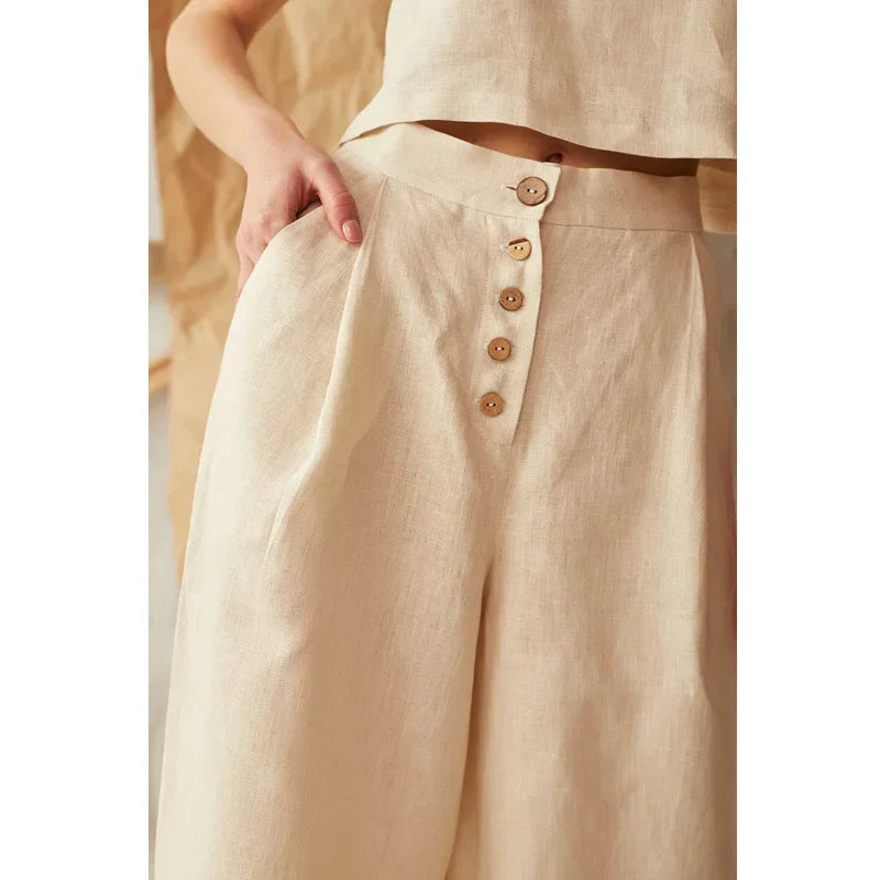 Women’s knit wide-leg elastic-waist trousers by Christine Brewer, loose pull-on style, shown in a relaxed fit with soft fabric.