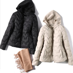 Christine Brewer Zoe hooded quilted puffer jacket for women, featuring a stylish insulated design and a cozy hood.