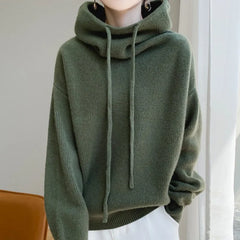 Ribbed women's hoodie by Christine Brewer featuring a relaxed fit and fern green color, casual style, and cozy fabric.