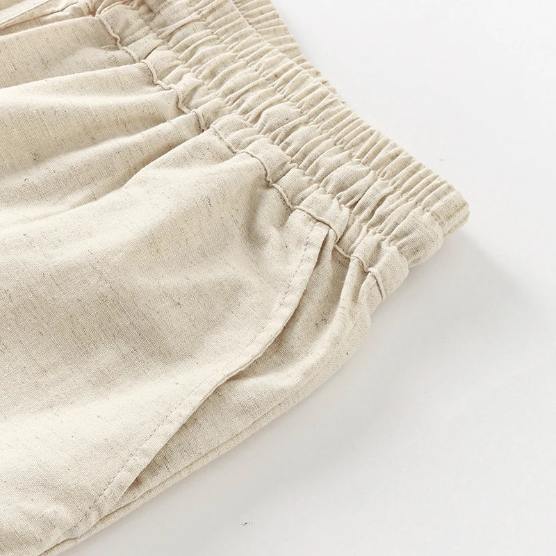 Women’s cotton linen wide leg drawstring trousers by Christine Brewer, loose pull-on pants with relaxed fit and comfortable waistband.