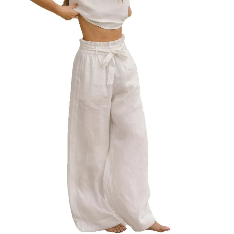 Light beige linen wide-leg trousers for women, loose pull-on pants with a relaxed fit, by Christine Brewer.