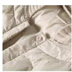Christine Brewer Zoe women's hooded quilted puffer jacket, stylish insulated outerwear with a hood and quilted design.