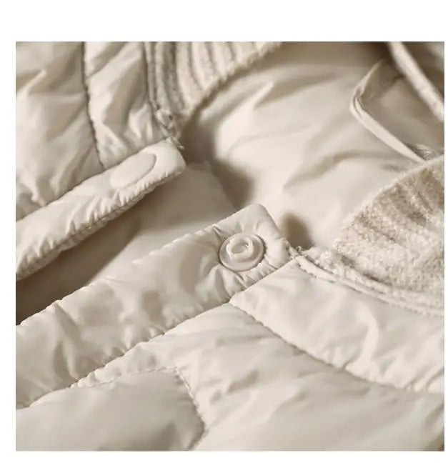 Christine Brewer Zoe women's hooded quilted puffer jacket, stylish insulated outerwear with a hood and quilted design.