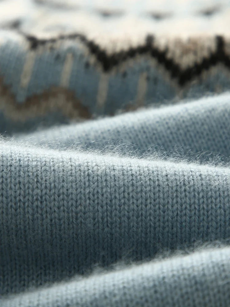 Christine Brewer Jolene cashmere mock neck sweater for women, soft beige knit, close-up of fabric and stylish neckline.