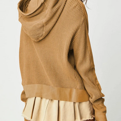 Mia cropped hooded hoodie for women by Christine Brewer, shown in a relaxed fit with front pocket and drawstring hood.