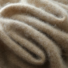 Helen cashmere sweater for women by Christine Brewer, soft cream-colored knit with a relaxed fit and cozy style.