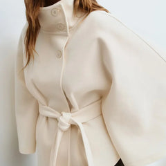 Emma belted cape coat for women by Christine Brewer, shown in a stylish, elegant design with a belt and flowing fabric.
