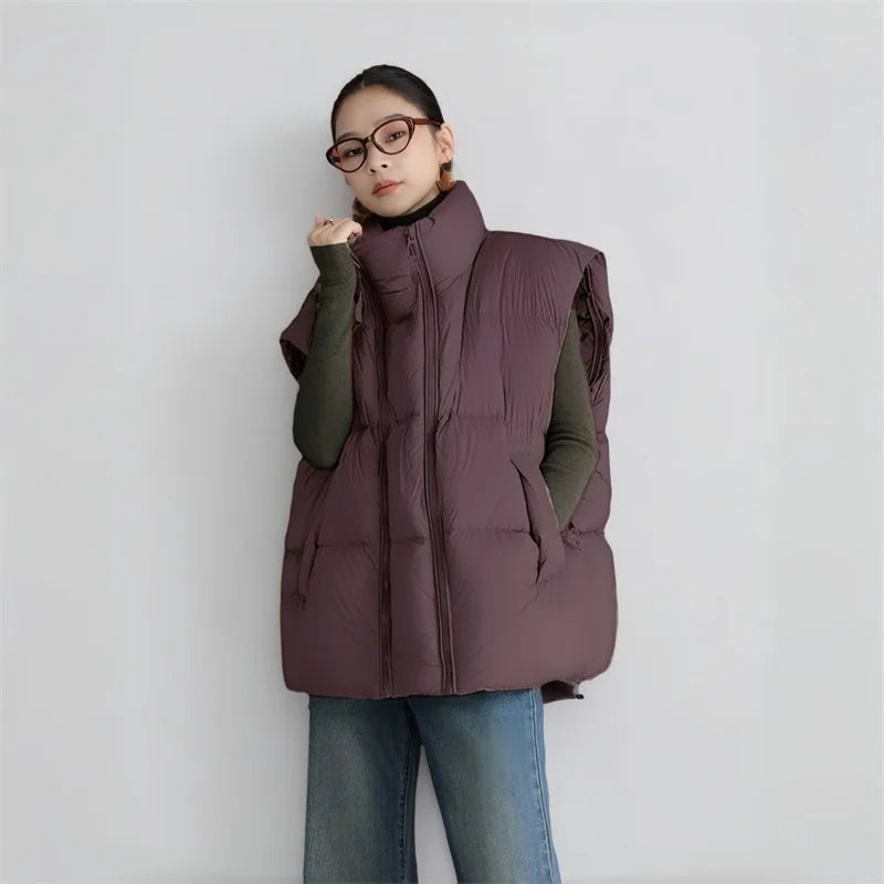 Christine Brewer Layla cropped puffer vest for women, lightweight quilted vest with stand collar and side pockets.