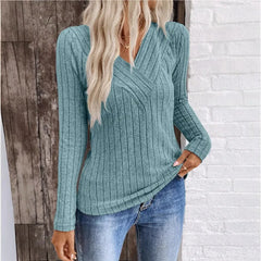 Kaitlyn striped women's sweater by Christine Brewer, featuring a cozy knit design with colorful horizontal stripes.