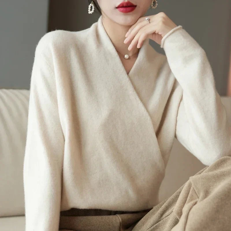Christine Brewer Gwen cashmere V-neck sweater for women, soft beige knit with long sleeves and a relaxed fit.