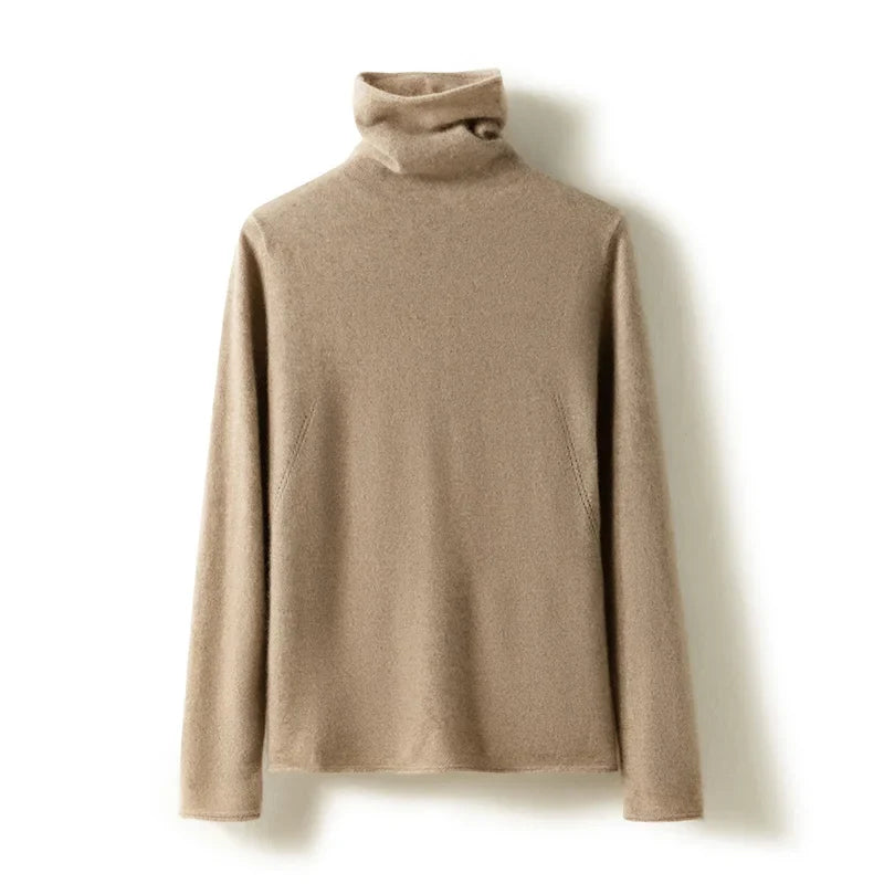 Cream-colored Gabrielle cashmere turtleneck sweater for women by Christine Brewer, displayed on a mannequin with a cozy, stylish fit.