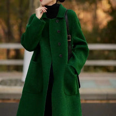 Green long wool coat for women, Lucy by Christine Brewer, shown in a stylish, cozy design with a tailored fit.