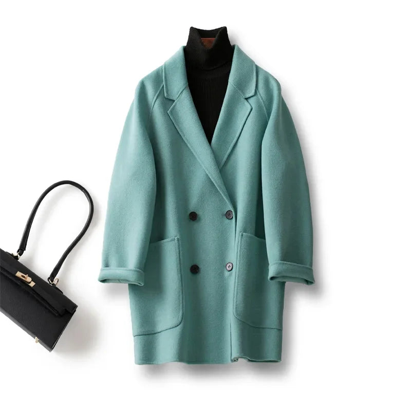 Brown double-breasted wool coat for women by Christine Brewer, featuring a classic style with lapels and button closures.