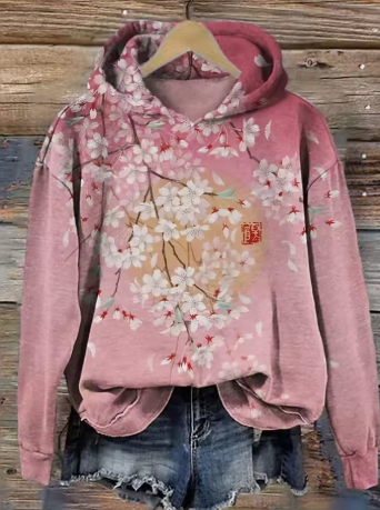 Cream-colored oversized knit hoodie from Christine Brewer's Georgia Classic Cozy collection featuring soft, plush fabric and relaxed fit.
