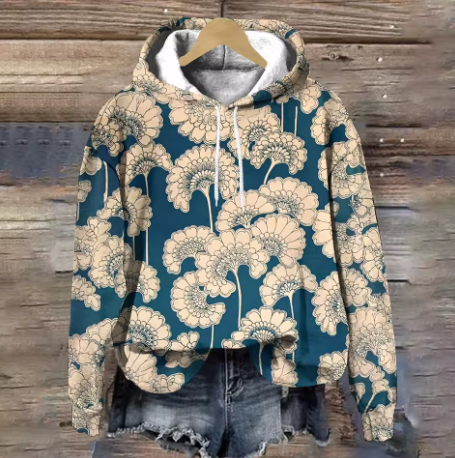 Lightweight oversized soft knit hoodie in beige from Christine Brewer's Adeline collection, cozy and perfect for casual wear.
