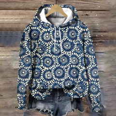 Lightweight oversized soft knit hoodie from Christine Brewer's Adeline collection, featuring cozy fabric and relaxed fit.