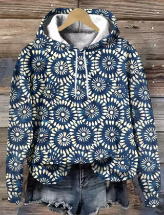 Lightweight oversized soft knit hoodie from Christine Brewer's Adeline collection, featuring cozy fabric and relaxed fit.
