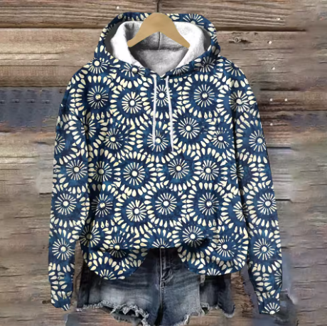 Lightweight oversized soft knit hoodie from Christine Brewer's Adeline collection, featuring cozy fabric and relaxed fit.