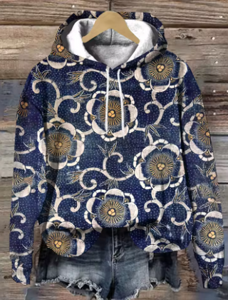 Lightweight oversized soft knit hoodie from Christine Brewer's Adeline collection, featuring a cozy design in neutral tones.