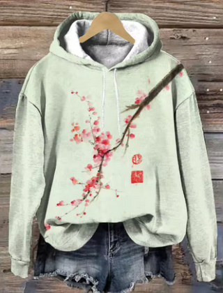 Maisie cozy oversized soft knit hoodie by Christine Brewer, featuring a relaxed fit, warm fabric, and stylish casual design.