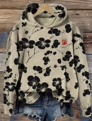 Lightweight oversized soft knit hoodie named Anna by Christine Brewer, featuring a cozy design and relaxed fit.
